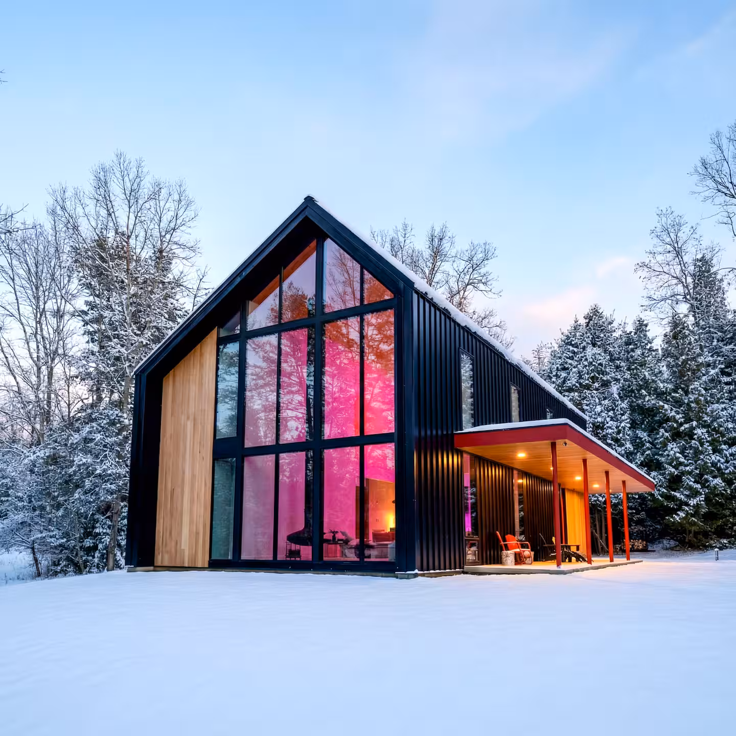 The Fernweh House exterior — winter, snow on the ground and roof